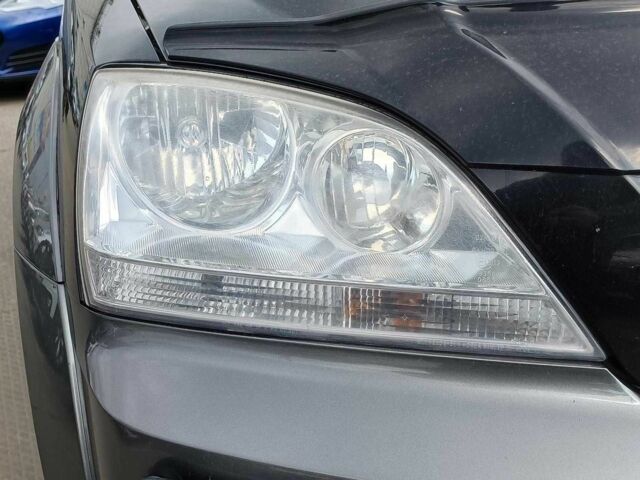 Черный Киа Соренто, объемом двигателя 2.4 л и пробегом 300 тыс. км за 6490 $, фото 11 на Automoto.ua