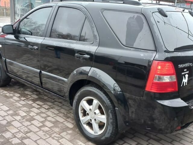 Чорний Кіа Соренто, об'ємом двигуна 2.5 л та пробігом 267 тис. км за 5100 $, фото 4 на Automoto.ua