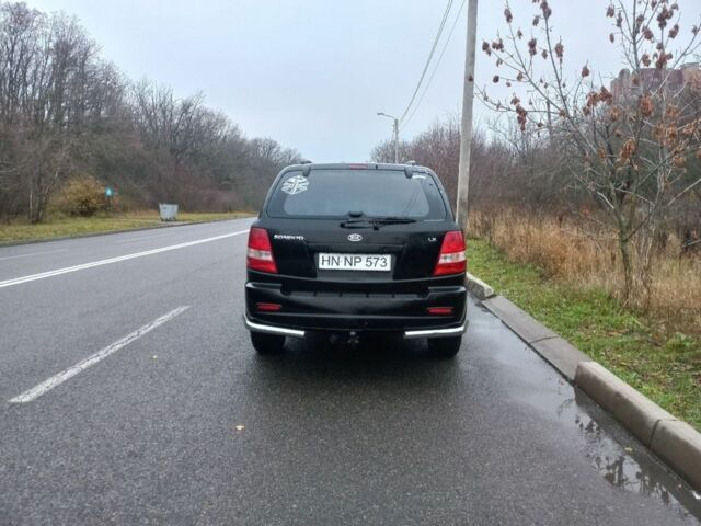 Чорний Кіа Соренто, об'ємом двигуна 2.5 л та пробігом 270 тис. км за 3800 $, фото 2 на Automoto.ua