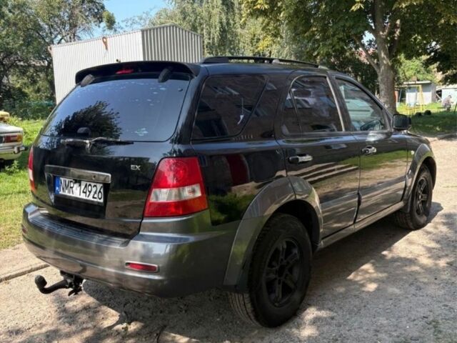 Чорний Кіа Соренто, об'ємом двигуна 2.5 л та пробігом 250 тис. км за 4700 $, фото 4 на Automoto.ua