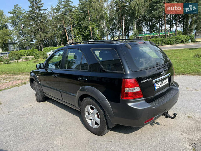 Черный Киа Соренто, объемом двигателя 2.5 л и пробегом 226 тыс. км за 8100 $, фото 3 на Automoto.ua