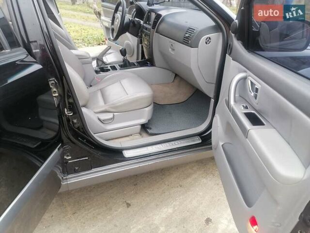 Чорний Кіа Соренто, об'ємом двигуна 2.5 л та пробігом 294 тис. км за 7400 $, фото 15 на Automoto.ua
