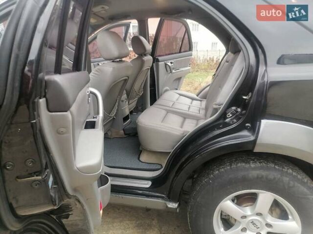 Чорний Кіа Соренто, об'ємом двигуна 2.5 л та пробігом 294 тис. км за 7400 $, фото 9 на Automoto.ua