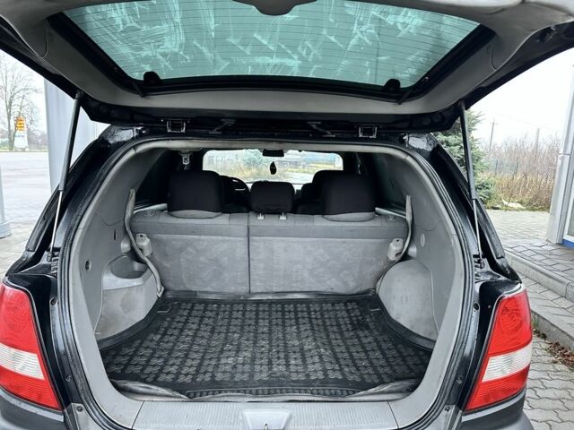 Черный Киа Соренто, объемом двигателя 2.5 л и пробегом 350 тыс. км за 3750 $, фото 8 на Automoto.ua