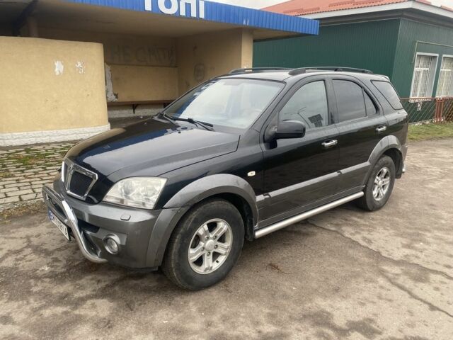 Черный Киа Соренто, объемом двигателя 2.5 л и пробегом 300 тыс. км за 6820 $, фото 1 на Automoto.ua