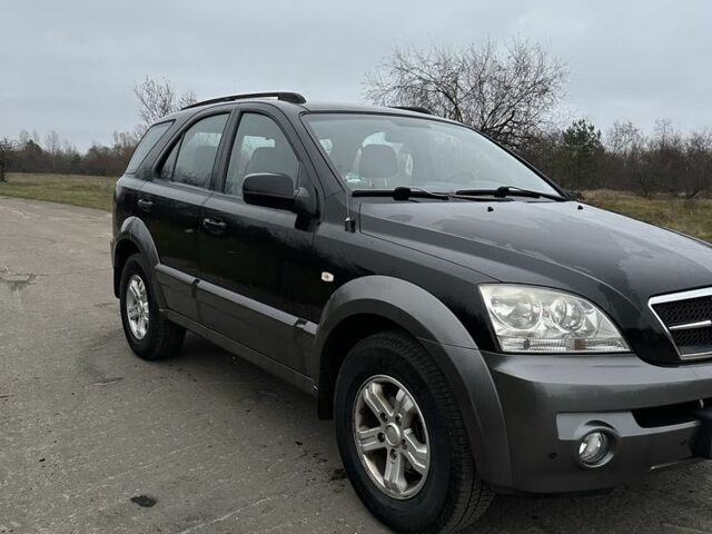 Черный Киа Соренто, объемом двигателя 2.5 л и пробегом 280 тыс. км за 4300 $, фото 2 на Automoto.ua