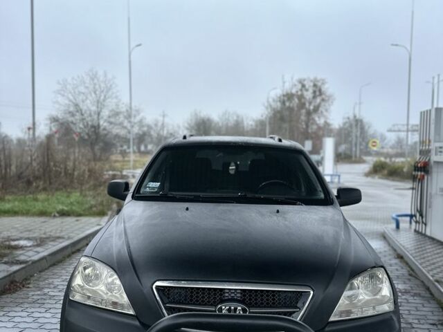 Черный Киа Соренто, объемом двигателя 2.5 л и пробегом 350 тыс. км за 3750 $, фото 1 на Automoto.ua