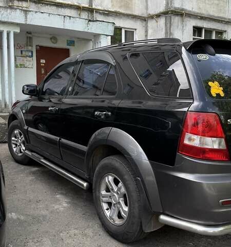 Черный Киа Соренто, объемом двигателя 2.4 л и пробегом 211 тыс. км за 6800 $, фото 3 на Automoto.ua