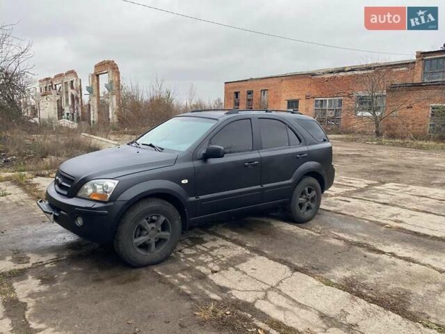 Черный Киа Соренто, объемом двигателя 2.5 л и пробегом 380 тыс. км за 5300 $, фото 1 на Automoto.ua