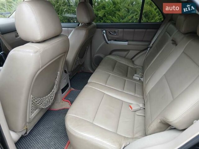 Черный Киа Соренто, объемом двигателя 2.5 л и пробегом 400 тыс. км за 4200 $, фото 10 на Automoto.ua