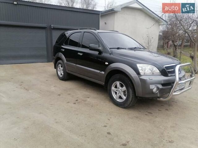 Чорний Кіа Соренто, об'ємом двигуна 2.5 л та пробігом 294 тис. км за 7400 $, фото 3 на Automoto.ua