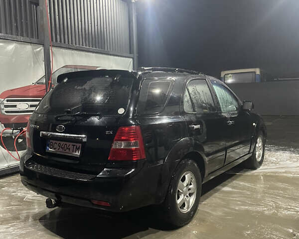 Чорний Кіа Соренто, об'ємом двигуна 2.5 л та пробігом 280 тис. км за 6899 $, фото 2 на Automoto.ua