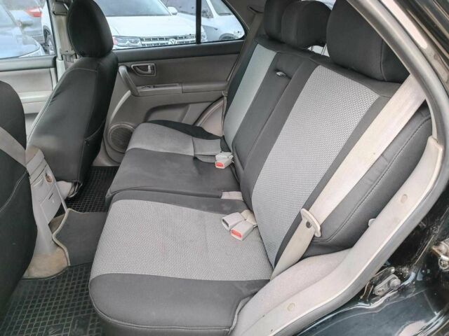 Черный Киа Соренто, объемом двигателя 2.4 л и пробегом 300 тыс. км за 6490 $, фото 23 на Automoto.ua