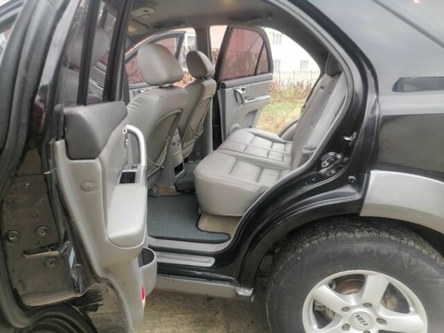 Чорний Кіа Соренто, об'ємом двигуна 2.5 л та пробігом 294 тис. км за 7400 $, фото 15 на Automoto.ua