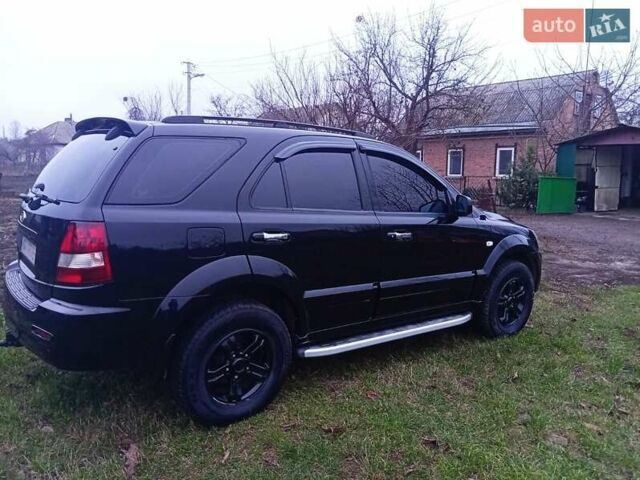 Черный Киа Соренто, объемом двигателя 3.5 л и пробегом 230 тыс. км за 6999 $, фото 2 на Automoto.ua