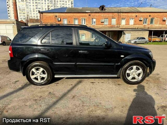 Черный Киа Соренто, объемом двигателя 2.5 л и пробегом 258 тыс. км за 4500 $, фото 4 на Automoto.ua