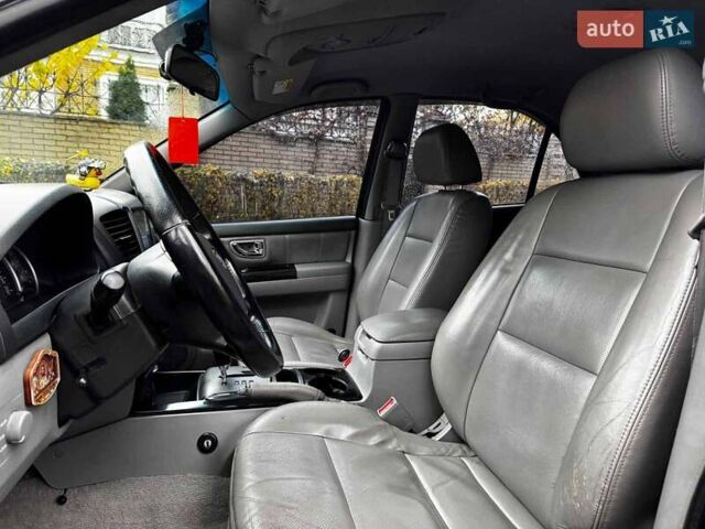 Чорний Кіа Соренто, об'ємом двигуна 2.5 л та пробігом 226 тис. км за 8490 $, фото 23 на Automoto.ua