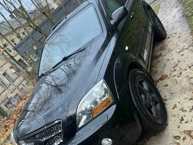 Черный Киа Соренто, объемом двигателя 2.5 л и пробегом 230 тыс. км за 4900 $, фото 7 на Automoto.ua