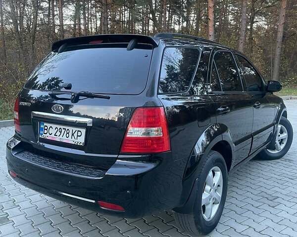 Черный Киа Соренто, объемом двигателя 2.5 л и пробегом 250 тыс. км за 8200 $, фото 11 на Automoto.ua