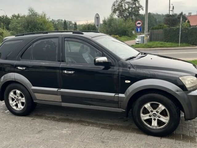 Черный Киа Соренто, объемом двигателя 2.5 л и пробегом 256 тыс. км за 3500 $, фото 2 на Automoto.ua