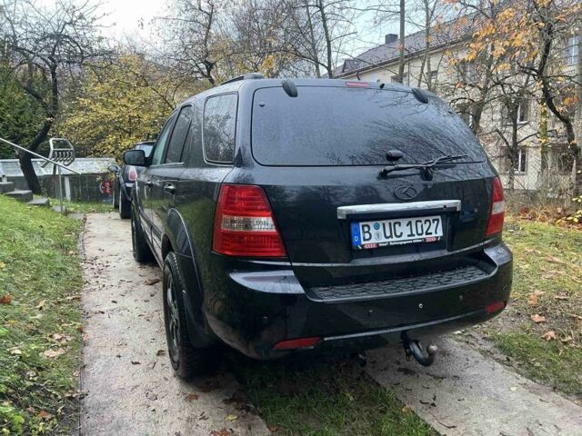 Черный Киа Соренто, объемом двигателя 2.5 л и пробегом 230 тыс. км за 4900 $, фото 3 на Automoto.ua