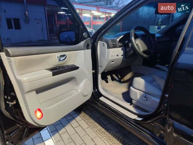 Черный Киа Соренто, объемом двигателя 2.5 л и пробегом 250 тыс. км за 9500 $, фото 13 на Automoto.ua