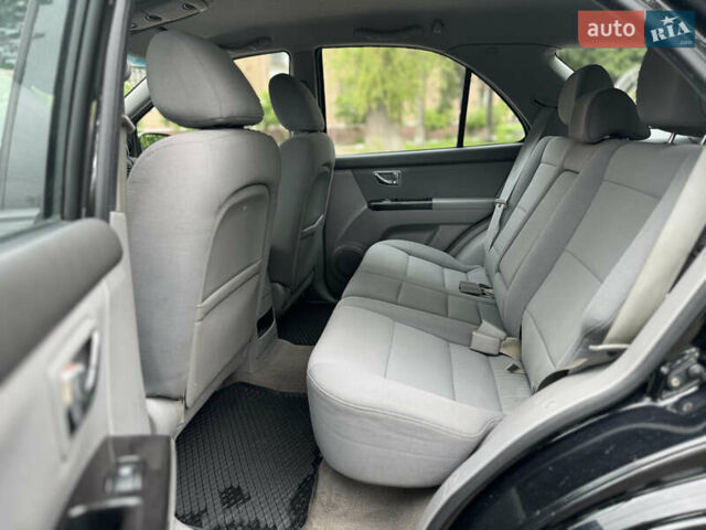 Черный Киа Соренто, объемом двигателя 2.5 л и пробегом 213 тыс. км за 7700 $, фото 11 на Automoto.ua