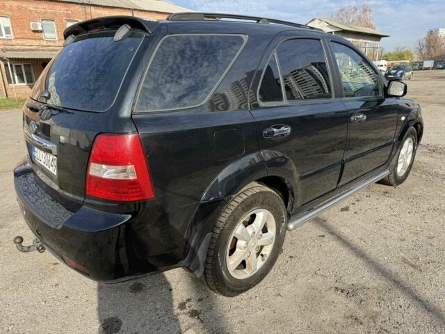 Черный Киа Соренто, объемом двигателя 2.5 л и пробегом 258 тыс. км за 4500 $, фото 2 на Automoto.ua