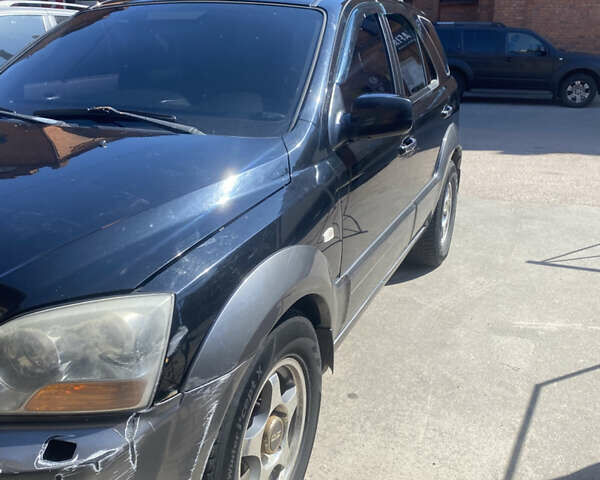 Чорний Кіа Соренто, об'ємом двигуна 2.5 л та пробігом 370 тис. км за 7000 $, фото 3 на Automoto.ua