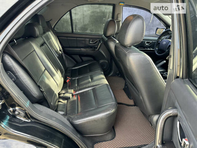 Черный Киа Соренто, объемом двигателя 2.5 л и пробегом 291 тыс. км за 9000 $, фото 13 на Automoto.ua