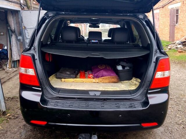 Черный Киа Соренто, объемом двигателя 2.5 л и пробегом 140 тыс. км за 9500 $, фото 4 на Automoto.ua