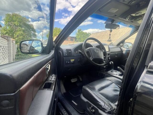 Черный Киа Соренто, объемом двигателя 2.5 л и пробегом 280 тыс. км за 4499 $, фото 13 на Automoto.ua