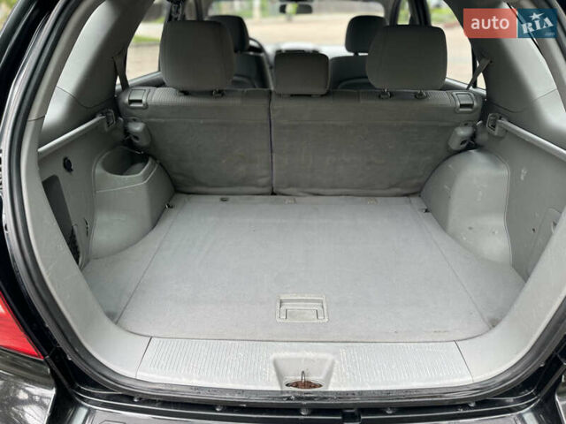 Черный Киа Соренто, объемом двигателя 2.5 л и пробегом 213 тыс. км за 7700 $, фото 12 на Automoto.ua