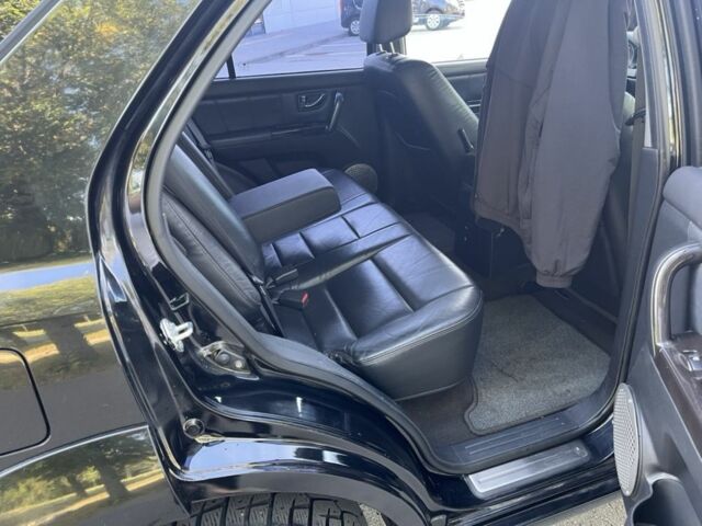 Чорний Кіа Соренто, об'ємом двигуна 2.5 л та пробігом 300 тис. км за 4800 $, фото 7 на Automoto.ua