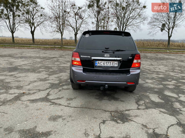 Чорний Кіа Соренто, об'ємом двигуна 2.5 л та пробігом 320 тис. км за 8299 $, фото 1 на Automoto.ua