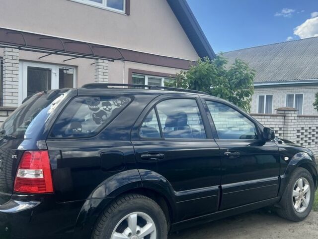 Черный Киа Соренто, объемом двигателя 2.5 л и пробегом 280 тыс. км за 4499 $, фото 4 на Automoto.ua