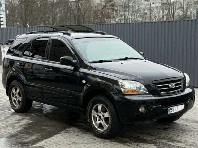 Черный Киа Соренто, объемом двигателя 2.4 л и пробегом 261 тыс. км за 6900 $, фото 3 на Automoto.ua
