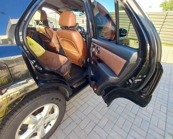 Чорний Кіа Соренто, об'ємом двигуна 2.5 л та пробігом 310 тис. км за 9000 $, фото 6 на Automoto.ua