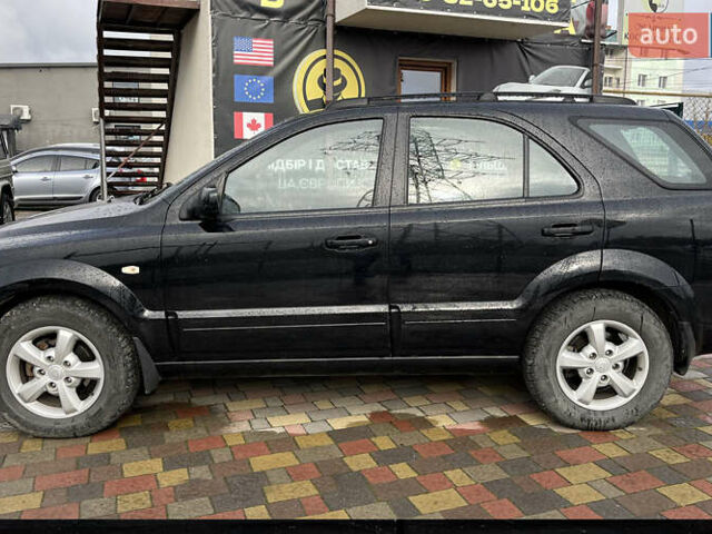 Чорний Кіа Соренто, об'ємом двигуна 2.5 л та пробігом 240 тис. км за 8999 $, фото 3 на Automoto.ua
