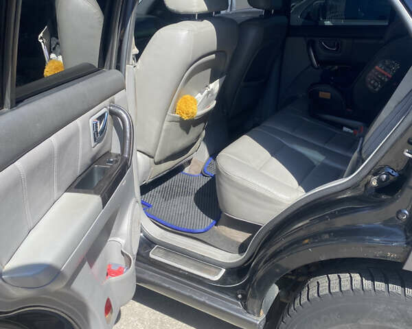 Чорний Кіа Соренто, об'ємом двигуна 2.5 л та пробігом 370 тис. км за 7000 $, фото 8 на Automoto.ua