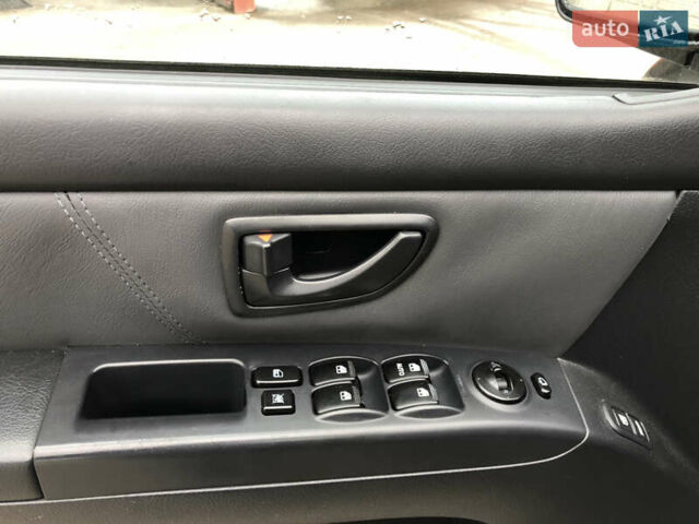 Черный Киа Соренто, объемом двигателя 3.34 л и пробегом 285 тыс. км за 7700 $, фото 13 на Automoto.ua