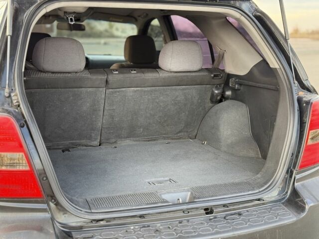 Черный Киа Соренто, объемом двигателя 2.5 л и пробегом 290 тыс. км за 5300 $, фото 11 на Automoto.ua