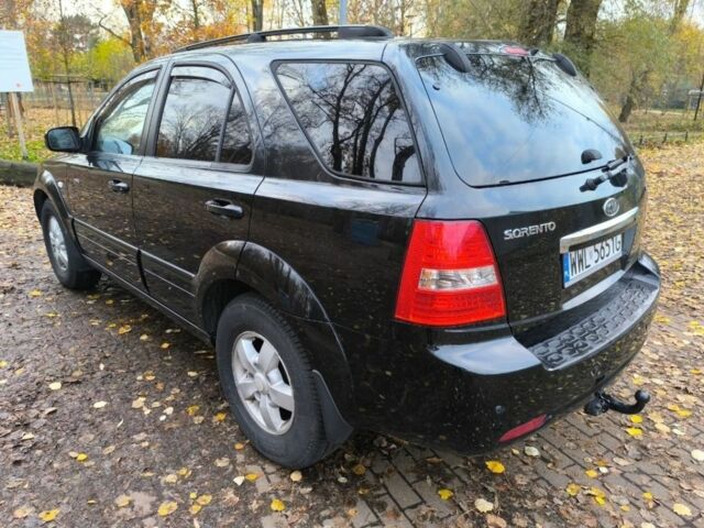 Черный Киа Соренто, объемом двигателя 2.5 л и пробегом 228 тыс. км за 3250 $, фото 4 на Automoto.ua