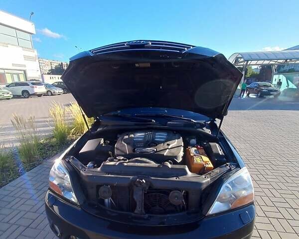 Чорний Кіа Соренто, об'ємом двигуна 2.5 л та пробігом 310 тис. км за 9000 $, фото 3 на Automoto.ua