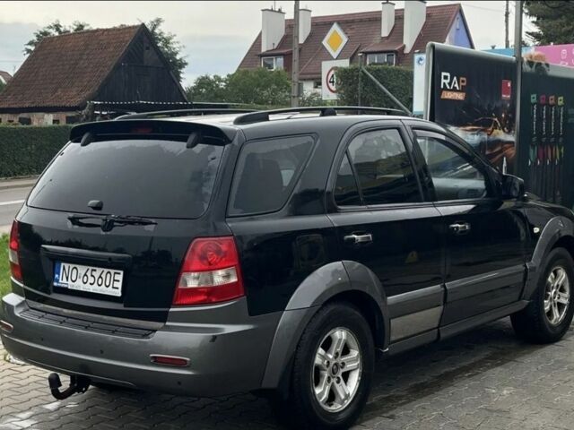 Черный Киа Соренто, объемом двигателя 2.5 л и пробегом 256 тыс. км за 3500 $, фото 3 на Automoto.ua