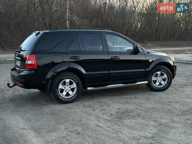 Черный Киа Соренто, объемом двигателя 2.5 л и пробегом 220 тыс. км за 8700 $, фото 8 на Automoto.ua