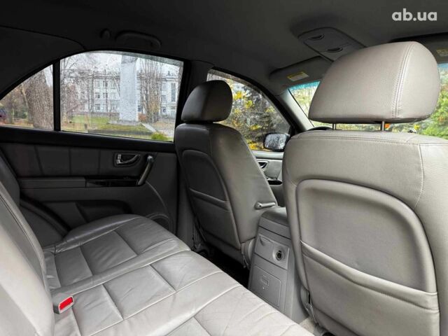 Чорний Кіа Соренто, об'ємом двигуна 2.5 л та пробігом 226 тис. км за 8490 $, фото 28 на Automoto.ua