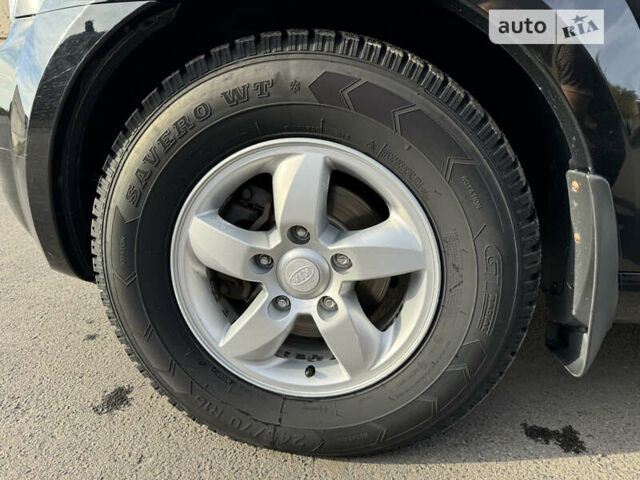 Черный Киа Соренто, объемом двигателя 2.5 л и пробегом 291 тыс. км за 9000 $, фото 10 на Automoto.ua