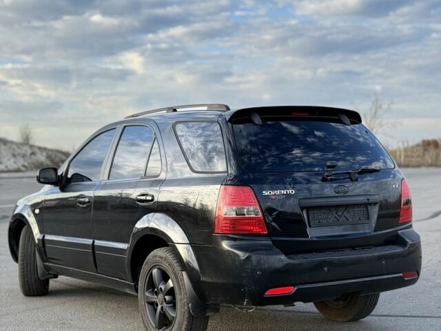 Черный Киа Соренто, объемом двигателя 2.5 л и пробегом 290 тыс. км за 5300 $, фото 1 на Automoto.ua