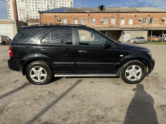 Черный Киа Соренто, объемом двигателя 2.5 л и пробегом 258 тыс. км за 4500 $, фото 1 на Automoto.ua